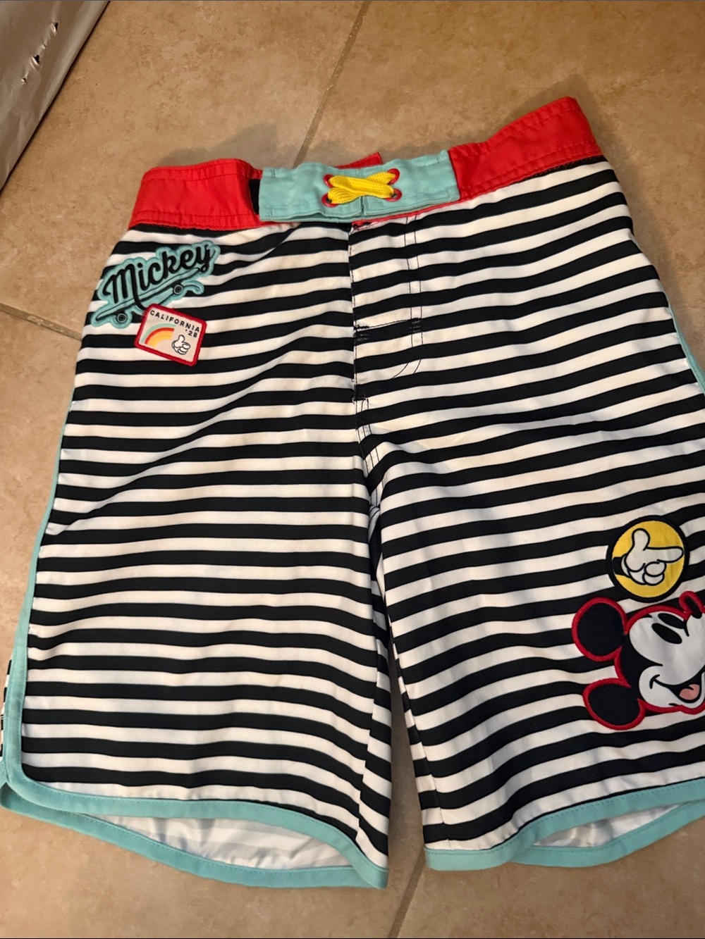 Disney Black & White Striped Mickey Swim Shorts with Red and Light Blue Accents